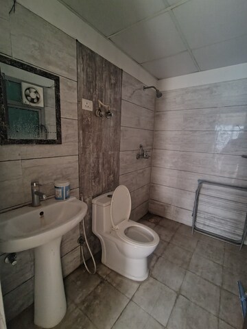 Bathroom in 2 BHK Apartment at Gulshan Bellina, Sector 16 Greater Noida – for Rent