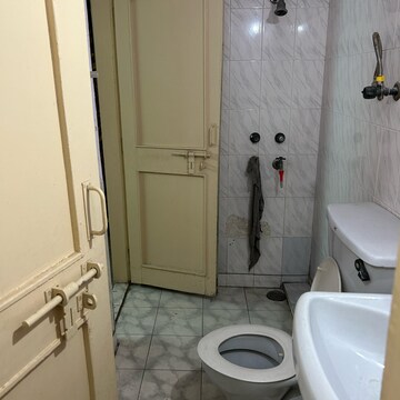 Bathroom in 3 BHK Apartment at Jal Vayu Vihar Noida, Sector 21 – for Rent