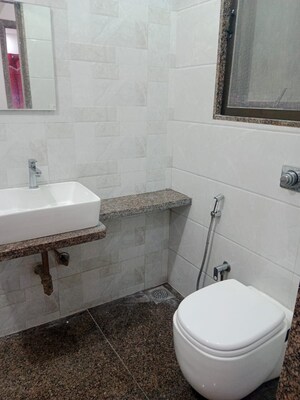 Bathroom in 2 BHK Apartment at Neminath Palace, Santacruz East – for Rent