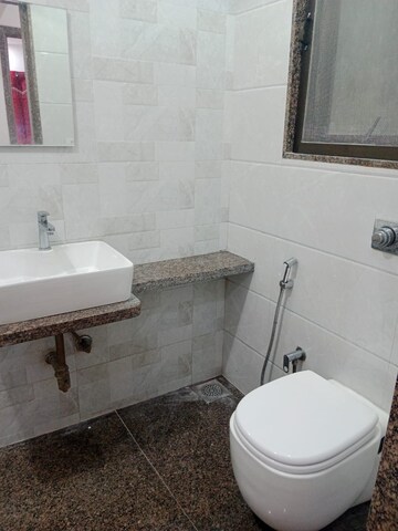 Bathroom in 2 BHK Apartment at Neminath Palace, Santacruz East – for Rent