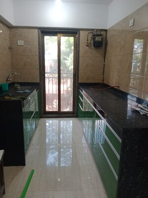 Kitchen in 2 BHK Apartment at Neminath Palace, Santacruz East – for Rent