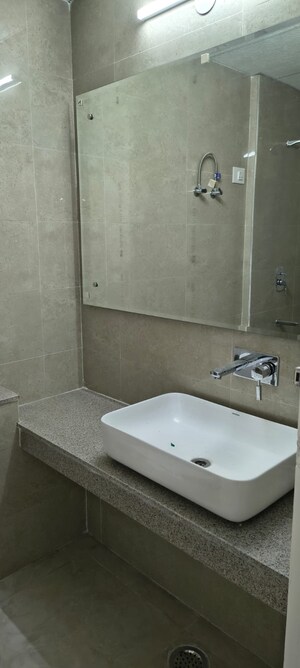 Bathroom in 3 BHK Apartment at Eldeco Live By The Greens, Sector 150 – for Rent