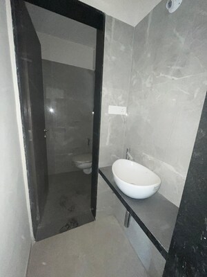 Bathroom in 3 BHK Apartment at Swojas Suman, Law College Road – for Sale