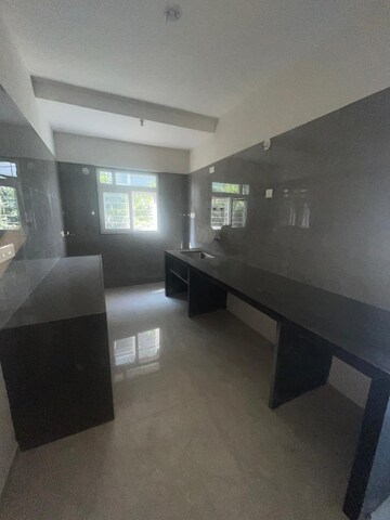 Kitchen in 3 BHK Apartment at Swojas Suman, Law College Road – for Sale