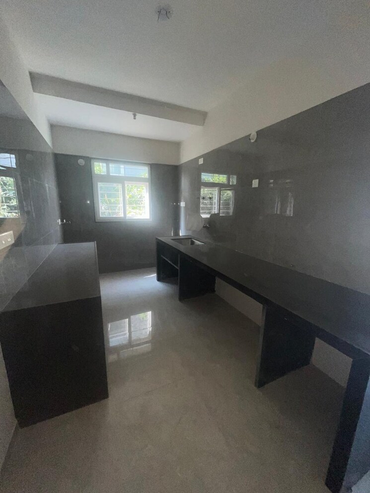 Kitchen, swojas-suman 3 Bedroom 1905 Sq.Ft. Apartment In Law College Road Pune 9704682