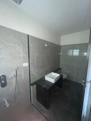 Bathroom in 3 BHK Apartment at Swojas Suman, Law College Road – for Sale