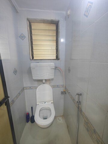 Bathroom in 1.5 BHK Apartment at Sakhu CHS, Seawoods Sector 44a – for Rent