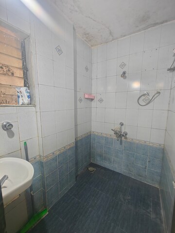 Bathroom in 1.5 BHK Apartment at Sakhu CHS, Seawoods Sector 44a – for Rent