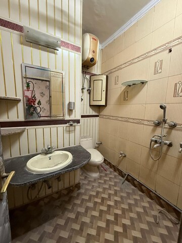 Bathroom in 2 BHK Builder Floor at Kalkaji – for Rent