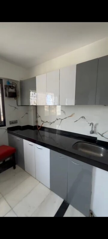 Kitchen in 2 BHK Apartment at Sanjeev Enclave, Andheri West – for Rent