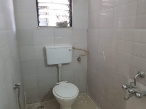 Bathroom in 2 BHK Apartment at Wadgaon Sheri – for Rent