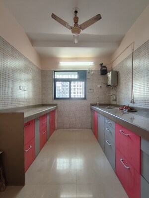 Kitchen in 2.5 BHK Apartment at Dosti Vihar, Samata Nagar – for Rent