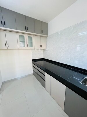 Kitchen in 2 BHK Apartment at Wadgaon Sheri – for Rent