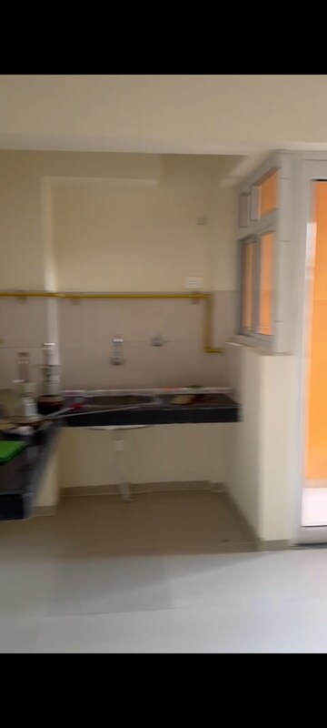 Kitchen in 1 BHK Apartment at Wave Dream Homes, Wave City – for Sale