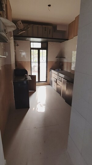 Kitchen in 3 BHK Apartment at Aakruti Kiran, Mira Road – for Sale
