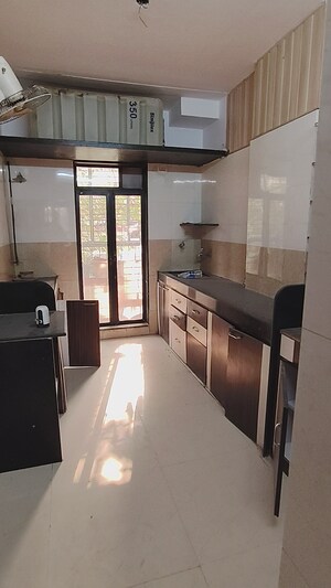 Kitchen in 3 BHK Apartment at Aakruti Kiran, Mira Road – for Sale