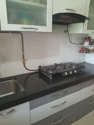 Kitchen in 1 BHK Apartment at KM Horizon Flora, Ghodbunder Road – for Rent