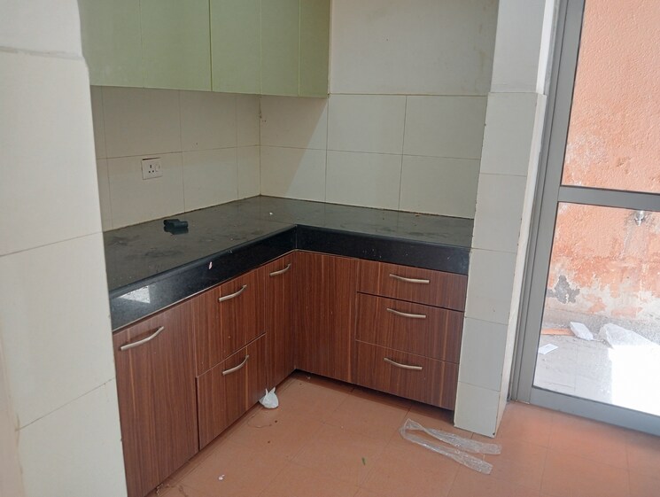 Kitchen, unitech-uniworld-gardens-2 3 Bedroom 1355 Sq.Ft. Apartment In Sector 47 Gurgaon 9705235