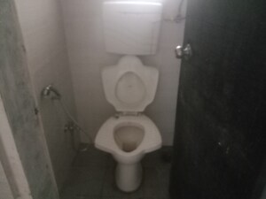 Bathroom in 1 BHK Apartment at Dosti West County, Balkum Pada – for Rent