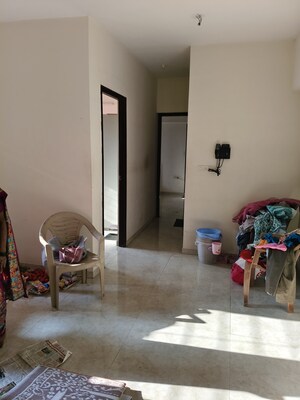 Living Room in 2 BHK Apartment at Lodha Amara, Kolshet Road – for Sale