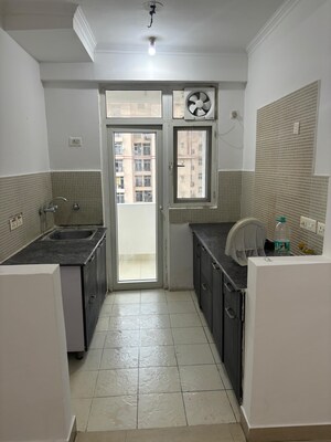 Kitchen in 3 BHK Apartment at Amrapali Platinum, Sector 119 – for Rent