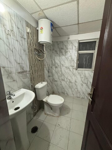 Bathroom in 3 BHK Apartment at Amrapali Platinum, Sector 119 – for Rent