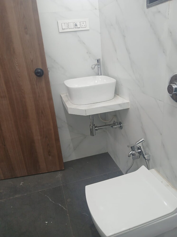 Bathroom, raj-infinia 2 Bedroom 750 Sq.Ft. Apartment In Malad West Mumbai 9705300