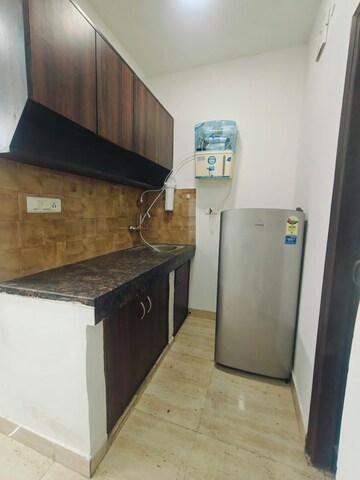 Kitchen in 1 RK Builder Floor at Ansal Sushant Lok I, Sector 43 – for Rent