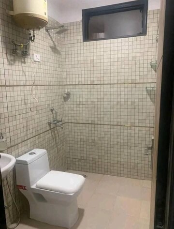 Bathroom in 3 BHK Apartment at Chattarpur – for Rent