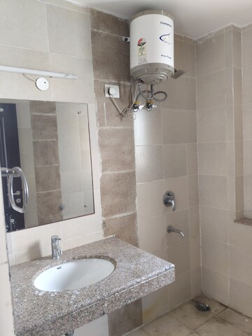 Bathroom in 3 BHK Apartment at Unitech Uniworld Gardens 2, Sector 47 – for Sale