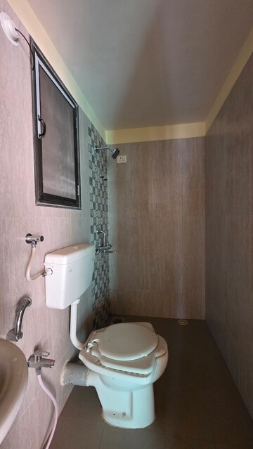 Bathroom in 2 BHK Apartment at Hubtown Greenwoods, Vartak Nagar – for Sale