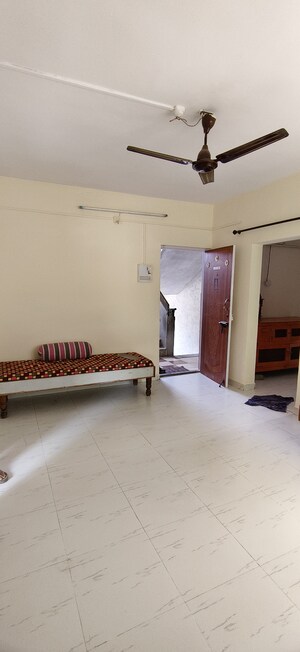 Living Room in 1.5 BHK Apartment at Wadgaon Sheri – for Rent