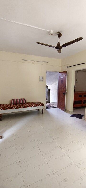 Living Room in 1.5 BHK Apartment at Wadgaon Sheri – for Rent