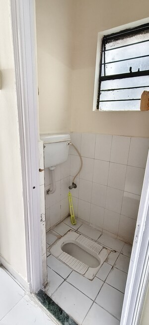 Bathroom in 1.5 BHK Apartment at Wadgaon Sheri – for Rent