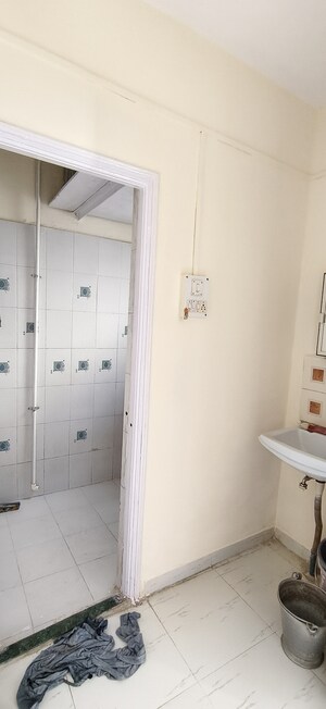 Bathroom in 1.5 BHK Apartment at Wadgaon Sheri – for Rent