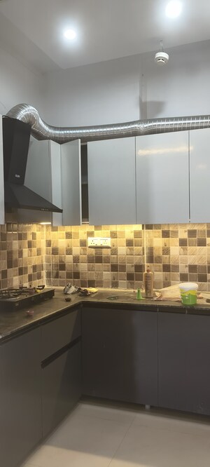 Kitchen in 1.5 BHK Apartment at Prateek Grand City, Siddharth Vihar – for Rent