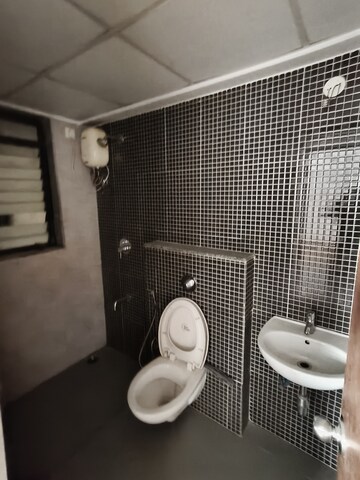 Bathroom in 1 BHK Apartment at Lodha Lakeshore Greens, Dombivli East – for Sale