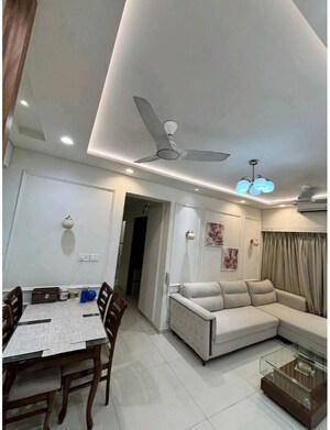 Living Room in 2 BHK Apartment at Rustomjee Urbania Azziano, Thane West – for Sale