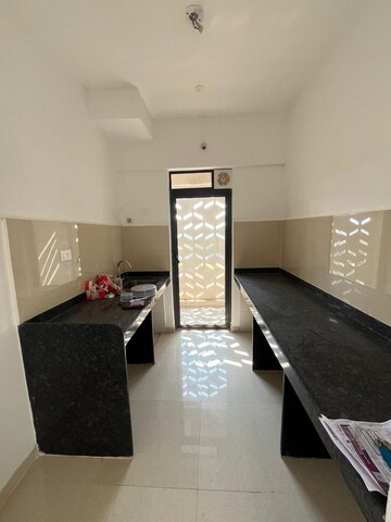Kitchen in 2 BHK Apartment at Lodha Palava Downtown, Dombivli East – for Sale