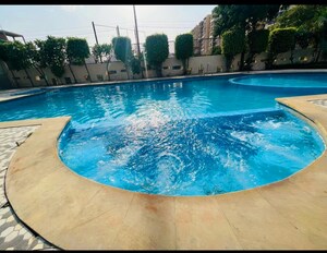Swimming Pool in 3.5 BHK Apartment at Ratan Galaxy, Vrindavan Yojna – for Sale