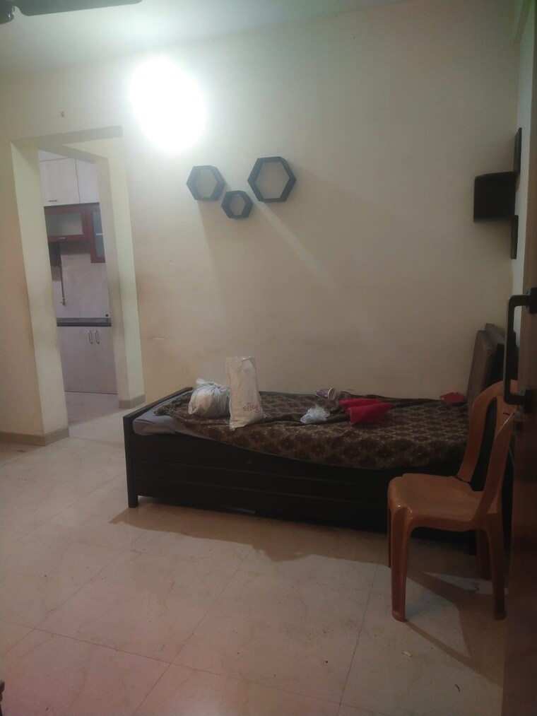 Living Room, manohar-vikas-shreeji-paraiso-phase-i 3 Bedroom 730 Sq.Ft. Apartment In Badlapur East Thane 9705613