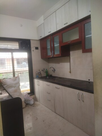 Kitchen in 3 BHK Apartment at Manohar Vikas Shreeji Paraiso Phase I, Badlapur East – for Rent