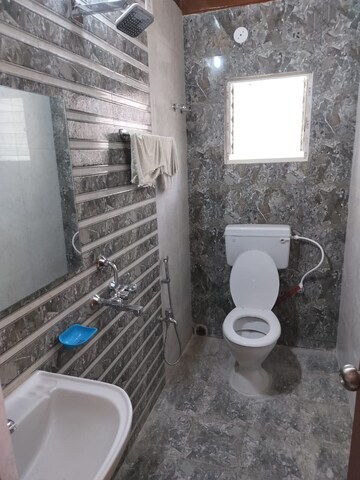 Bathroom in 1 BHK Apartment at Natural Awas, Chinar Park – for Sale