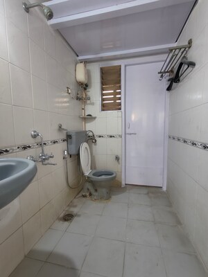 Bathroom in 2 BHK Apartment at Vedant Complex CHS, Samata Nagar – for Rent