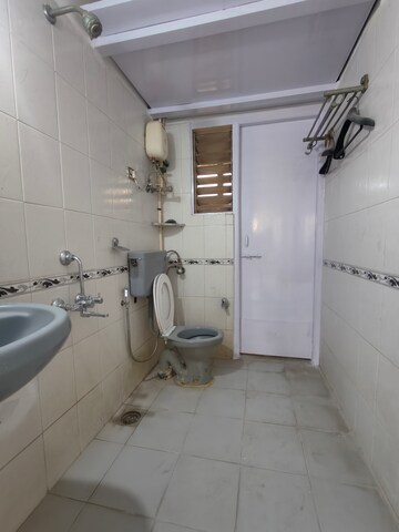 Bathroom in 2 BHK Apartment at Vedant Complex CHS, Samata Nagar – for Rent