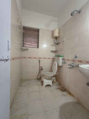 Bathroom in 2 BHK Apartment at Vedant Complex CHS, Samata Nagar – for Rent