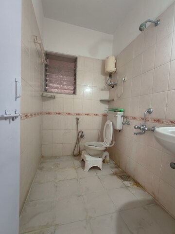 Bathroom in 2 BHK Apartment at Vedant Complex CHS, Samata Nagar – for Rent