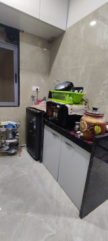 Kitchen in 2 BHK Apartment at Nakul Raj , Malad West – for Rent