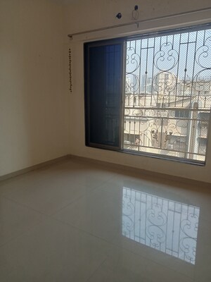 Room in 1 BHK Apartment at Aurigae Residency, Kandivali East – for Rent