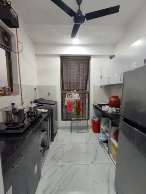 Kitchen in 1 BHK Apartment at Raymond Ten X Habitat, Pokhran Road No Two – for Rent